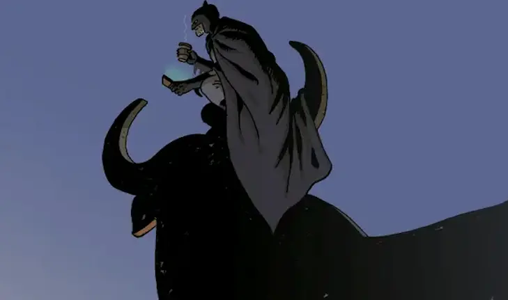 Batman con su caf&eacute; y su tel&eacute;fono m&oacute;vil, encaramado a un toro de Osborne.  Fotograf&iacute;a: TM & &copy; 2021 DC COMICS