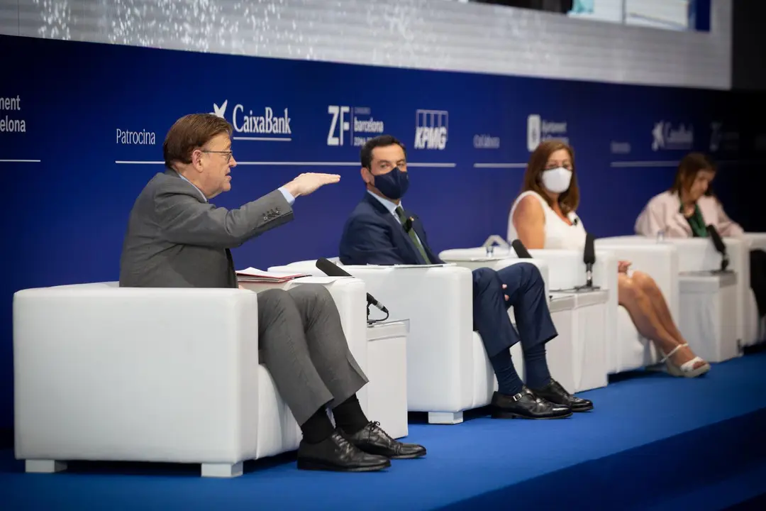 (I-D) El presidente de la Generalitat Valenciana, Ximo Puig; el presidente de la Junta de Andaluc&iacute;a, Juanma Moreno y la presidenta de las Islas Balerares, Francina Armengol, intervienen en una sesi&oacute;n, bajo el t&iacute;tulo: `El modelo territorial para mejorar la
