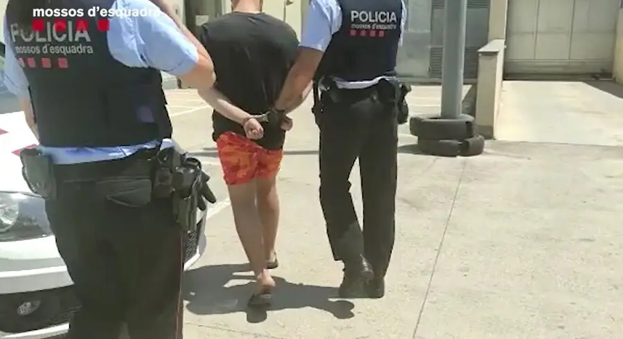 Archivo - Uno de los tres detenidos por presuntamente cometer la agresi&oacute;n hom&oacute;foba en la playa del Somorrostro de Barcelona el 29 de mayo. En Barcelona el 28 de julio de 2021.