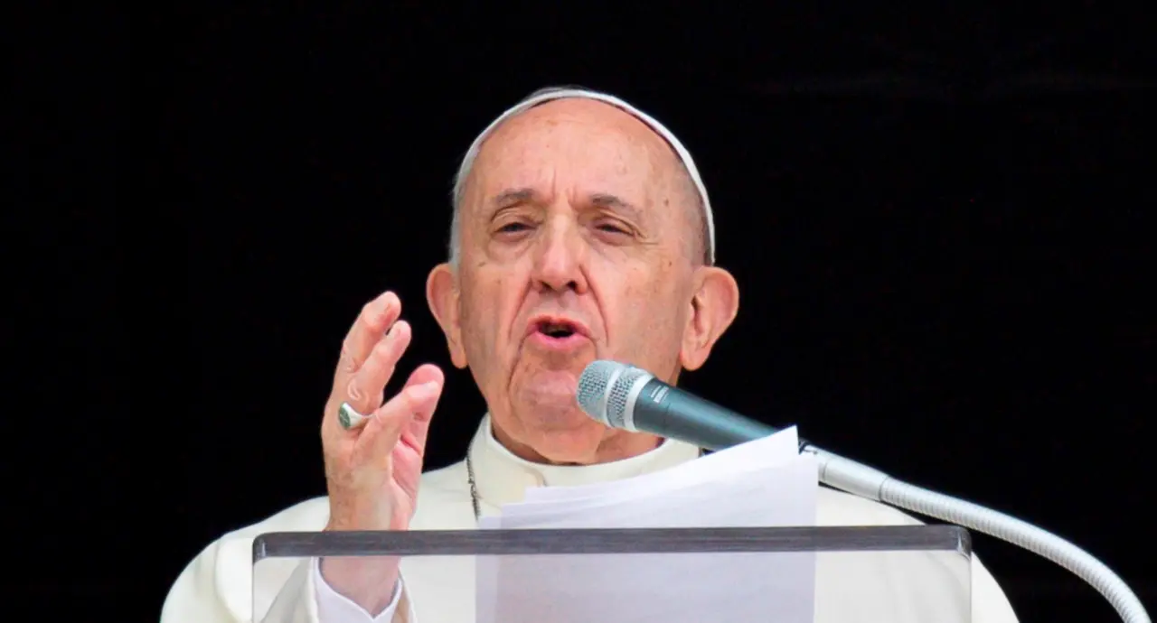 A handout picture provided by the Vatican Media shows Pope Francis reciting the Angelus prayer from the window of his study overlooking Saint Peter's Square, Vatican City, 26 September 2021. (Papa) EFE/EPA/VATICAN MEDIA HANDOUT HANDOUT EDITORIAL USE ONLY/NO SALES