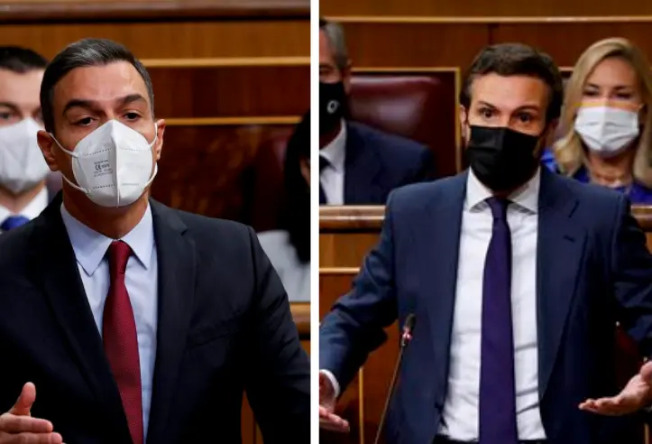 Pedro S&aacute;nchez y Pablo Casado durante la sesi&oacute;n de control al Gobierno. / EFE