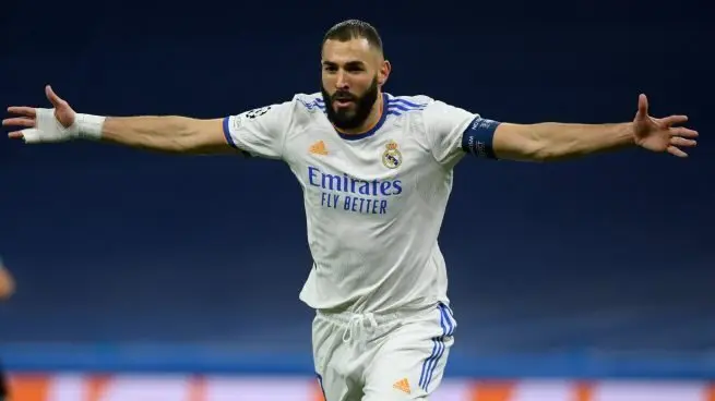 Benzema celebra el 1.000 del Real Madrid en la Champions. (AFP)