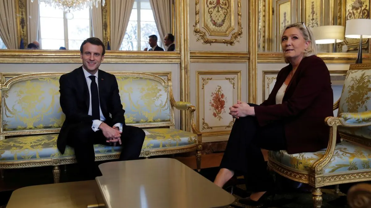 Emmanuel Macron y Marine Le Pen en una reuni&oacute;n anterior.
