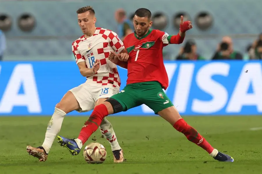 Una acci&oacute;n del partido entre Croacia y Marruecos. EFE / Tolga Bozoglu