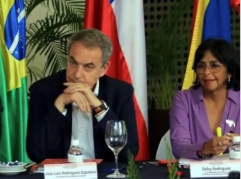 Rodr&iacute;guez Zapatero y Delcy Rodr&iacute;guez.