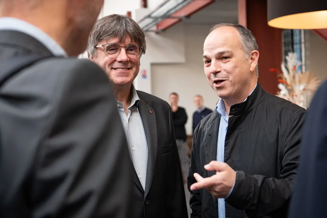 El expresidente de la Generalitat de Catalunya, Carles Puigdemont (i), y el secretario general de Junts per Catalunya, Jordi Turull (d). EP / Archivo
