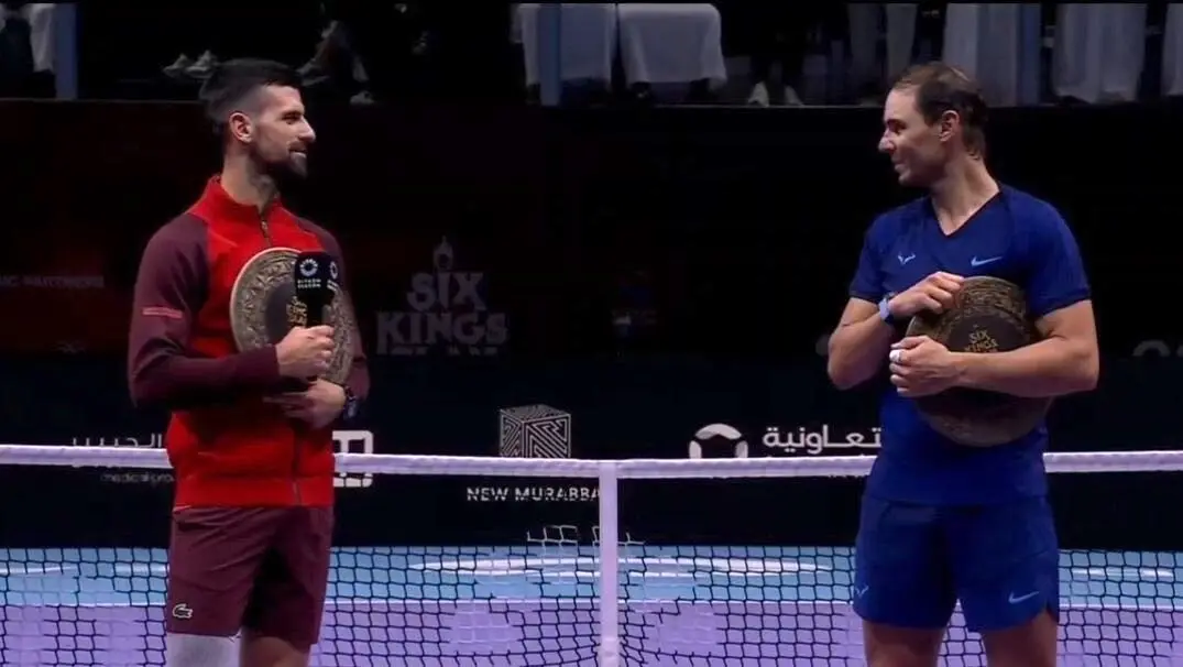Djokovic y Rafa Nadal tras su &uacute;ltimo partido. / RedX