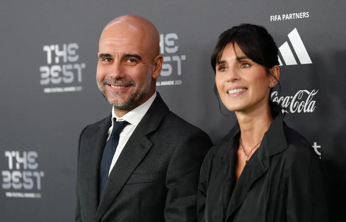 Pep Guardiola junto a Cristina Serra. EP / Archivo
