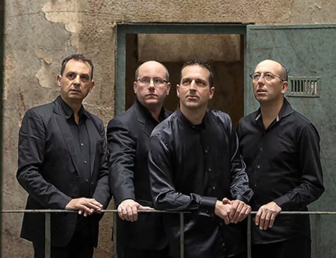 El cuarteto musical, tras un recital. / x
