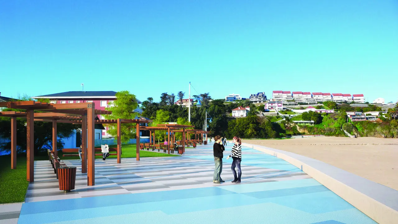 Dos personas pasean por el Paseo Mar&iacute;timo Suances, una de las localidades con mayor atractivo tur&iacute;stico durante el verano. / Alerta