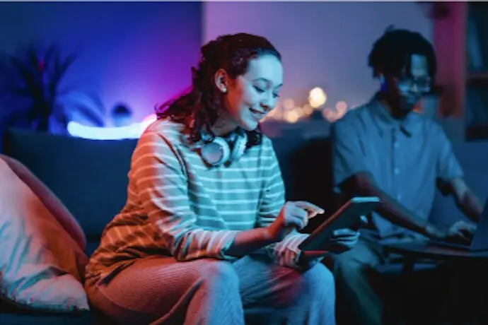 https://www.freepik.com/free-photo/side-view-smiley-woman-home-using-headphones-
tablet_11631555.htm