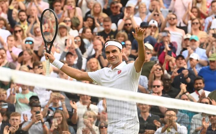 Roger Federer of Switzerland celebrates after winning his second round match against Richard Gasquet of France at the Wimbledon Championships, Wimbledon, Britain 01 July 2021. (Tenis, Francia, Suiza, Reino Unido) EFE/EPA/FACUNDO ARRIZABALAGA