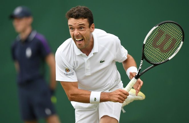 Roberto Bautista Agut of Spain in action against Miomir Kecmanovic of Serbia during their second round match at the Wimbledon Championships, Wimbledon, Britain, 30 June 2021. (Tenis, España, Reino Unido) EFE