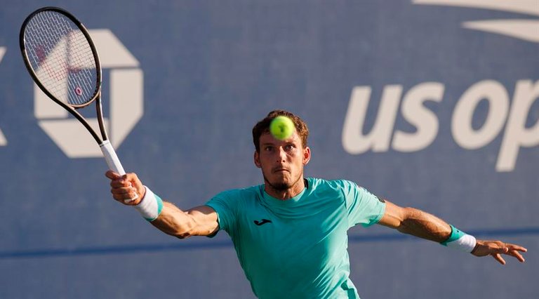 Pablo Carreno Busta of Spain returns a hit in his first round match against Dominic Thiem of Austria during the US Open Tennis Championships at the USTA National Tennis Center in in Flushing Meadows, New York, USA, 29 August 2022. The US Open runs from 29 August through 11 September. (Tenis, Abierto, España, Estados Unidos, Nueva York) EFE/EPA/CJ GUNTHER