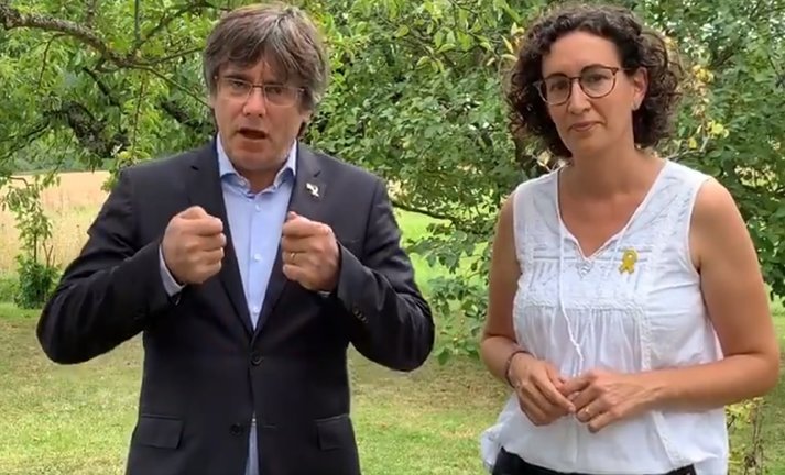 El expresidente de la Generalitat Carles Puigdemont y la secretaria general de ERC, Marta Rovira. / EP