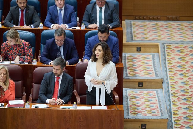 La presidenta de la Comunidad de Madrid, Isabel Díaz Ayuso, interviene durante una sesión de control al Gobierno de la Comunidad de Madrid. Jesús Hellín