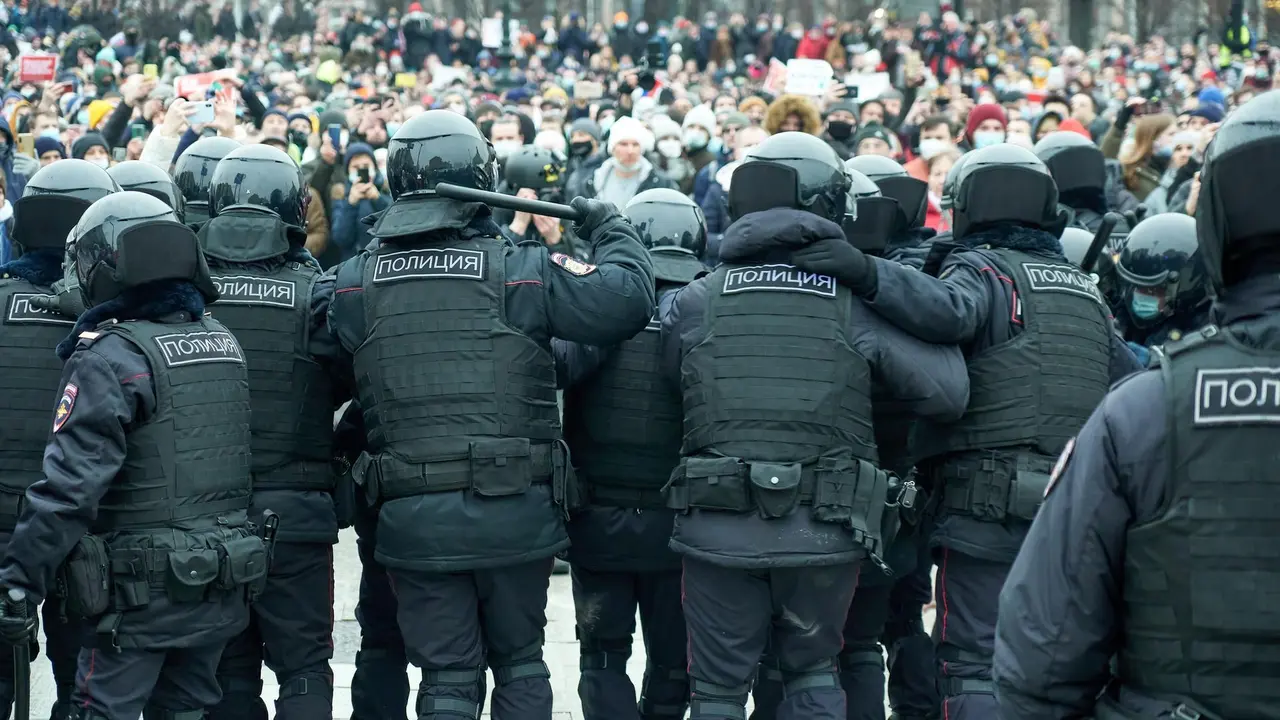 Police officers confront crowds of protesters during the demonstration..Rallies were held in the largest cities of Russia in support of the opposition leader Alexei Navalny, who was sent into custody after returning to Russia from Germany on suspicion of evading the control of the FSIN (Federal Penitentiary Service). The actions were accompanied by arrests on an unprecedented scale.