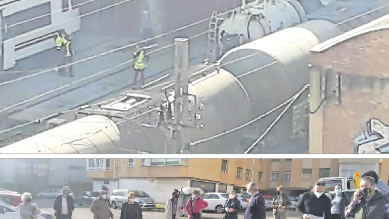 Imagen tomada ayer por la tarde de los vagones y de la concentraci&oacute;n vecinal. / ALERTA