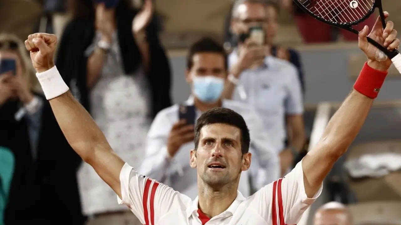 Novak Djokovic of Serbia celebrates winning against Rafael Nadal of Spain during their semi final match at the French Open tennis tournament at Roland Garros in Paris, France, 11 June 2021. (Tenis, Abierto, Francia, Espa&ntilde;a) EFE/EPA/YOAN VALAT