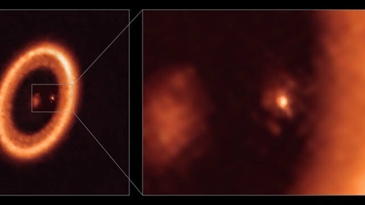 Archivo - Vistas de amplio campo y ampliaci&oacute;n de un disco de formaci&oacute;n de lunas visto con ALMA