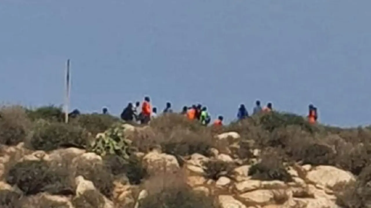 Migrantes llegados a Isla Tierra.