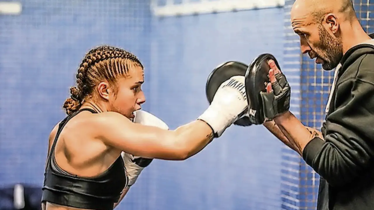 Marian Herrer&iacute;a, junto a su entrenador Dani Rasilla.