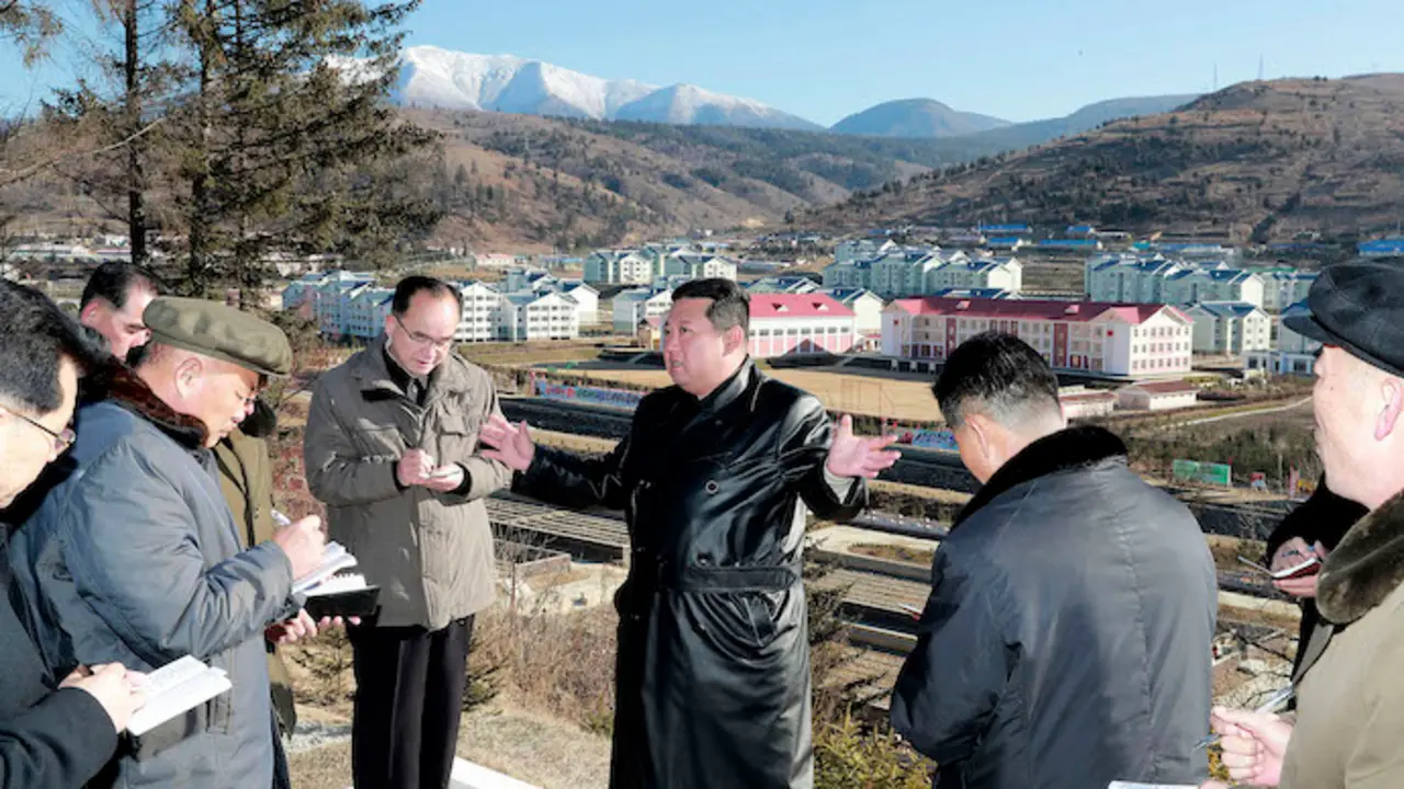This undated photo provided on Nov. 16, 2021, by the North Korean government, North Korean leader Kim Jong Un, center, inspects a major development project site in Samjiyon, Ryanggang province, North Korea. Independent journalists were not given access to cover the event depicted in this image distributed by the North Korean government. The content of this image is as provided and cannot be independently verified. Korean language watermark on image as provided by source reads: "KCNA" which is the abbreviation for Korean Central News Agency. (Korean Central News Agency/Korea News Service via AP)