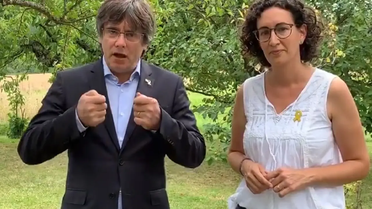 El expresidente de la Generalitat Carles Puigdemont y la secretaria general de ERC, Marta Rovira. / EP