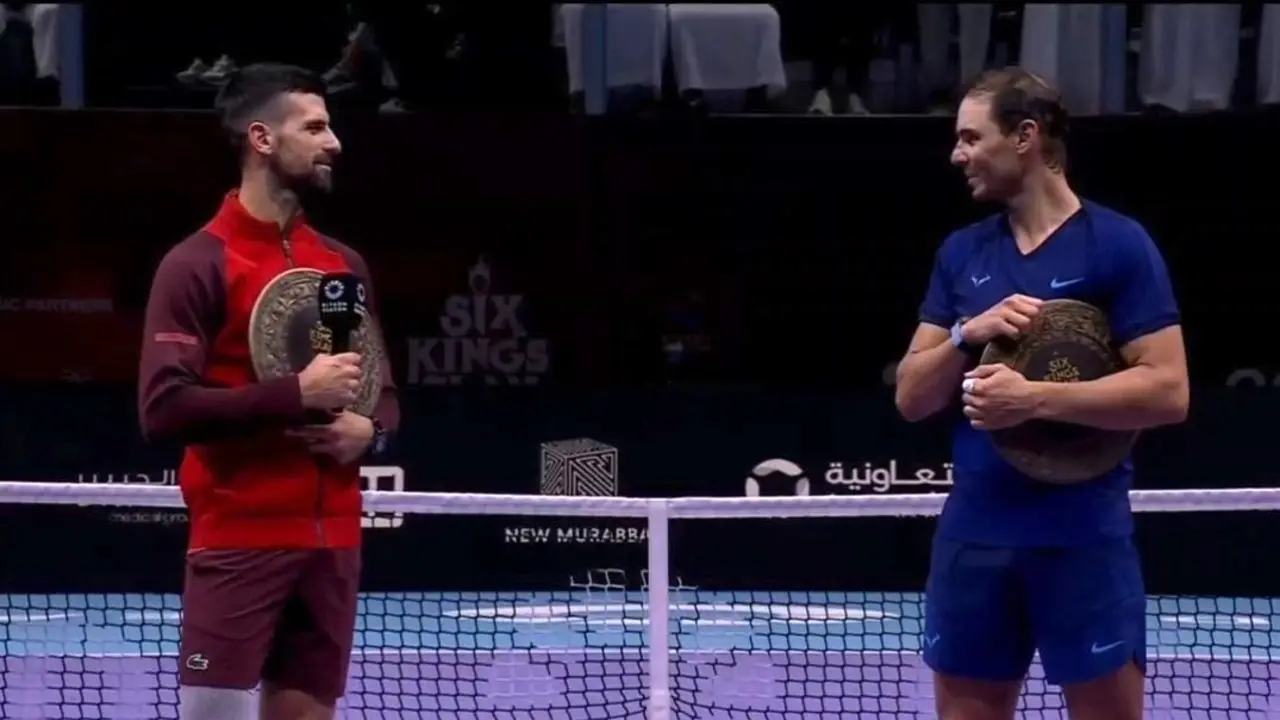 Djokovic y Rafa Nadal tras su &uacute;ltimo partido. / RedX