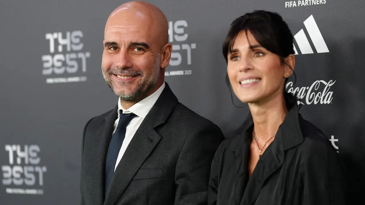 Pep Guardiola junto a Cristina Serra. EP / Archivo